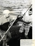 Henry White and Bruce Pitcairn, team members of the Oceanographic research group, bring an instrument back on board Nova's research vessel the Gulf Stream
